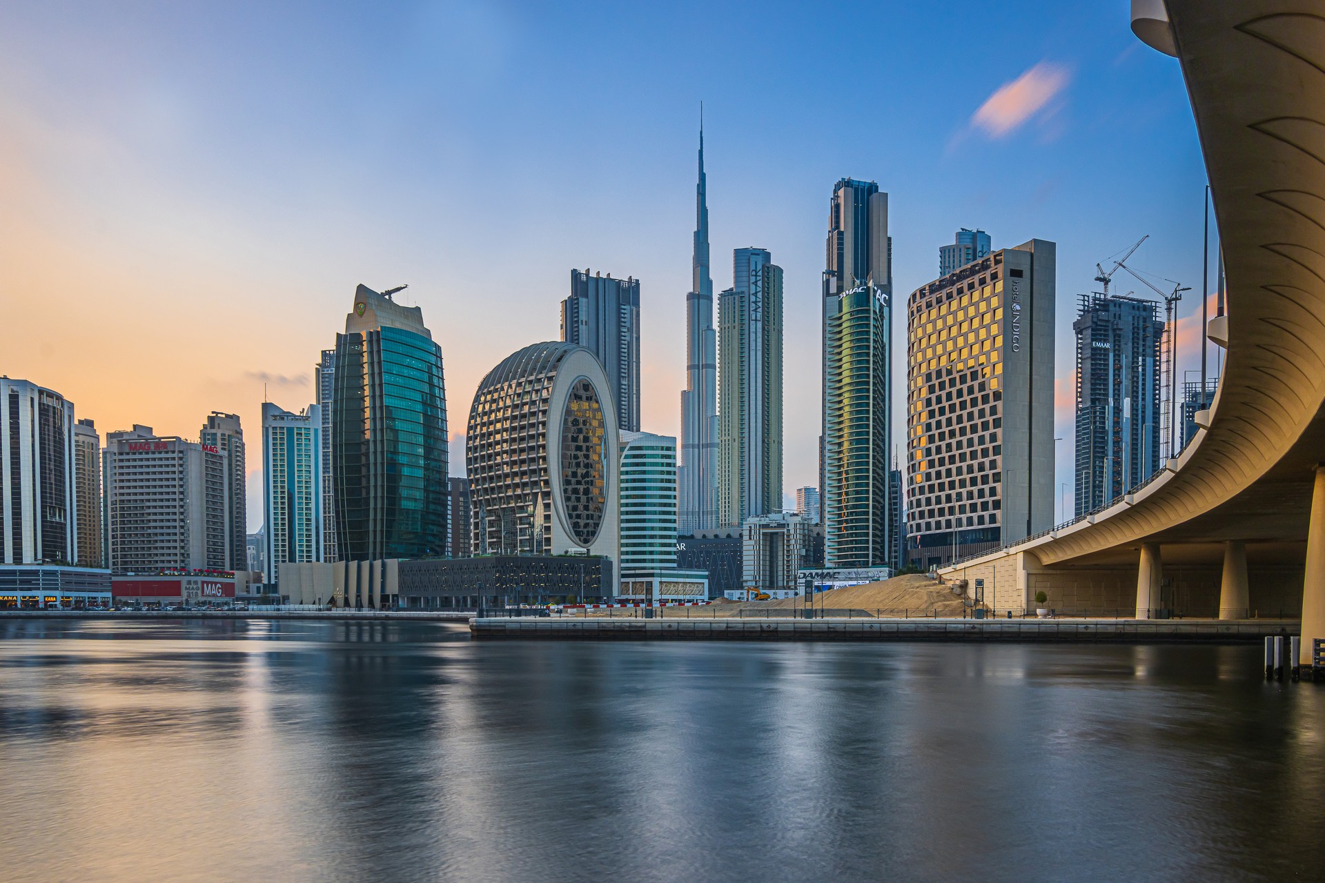 Evening mood with a view of the Dubai skyline with a bridge